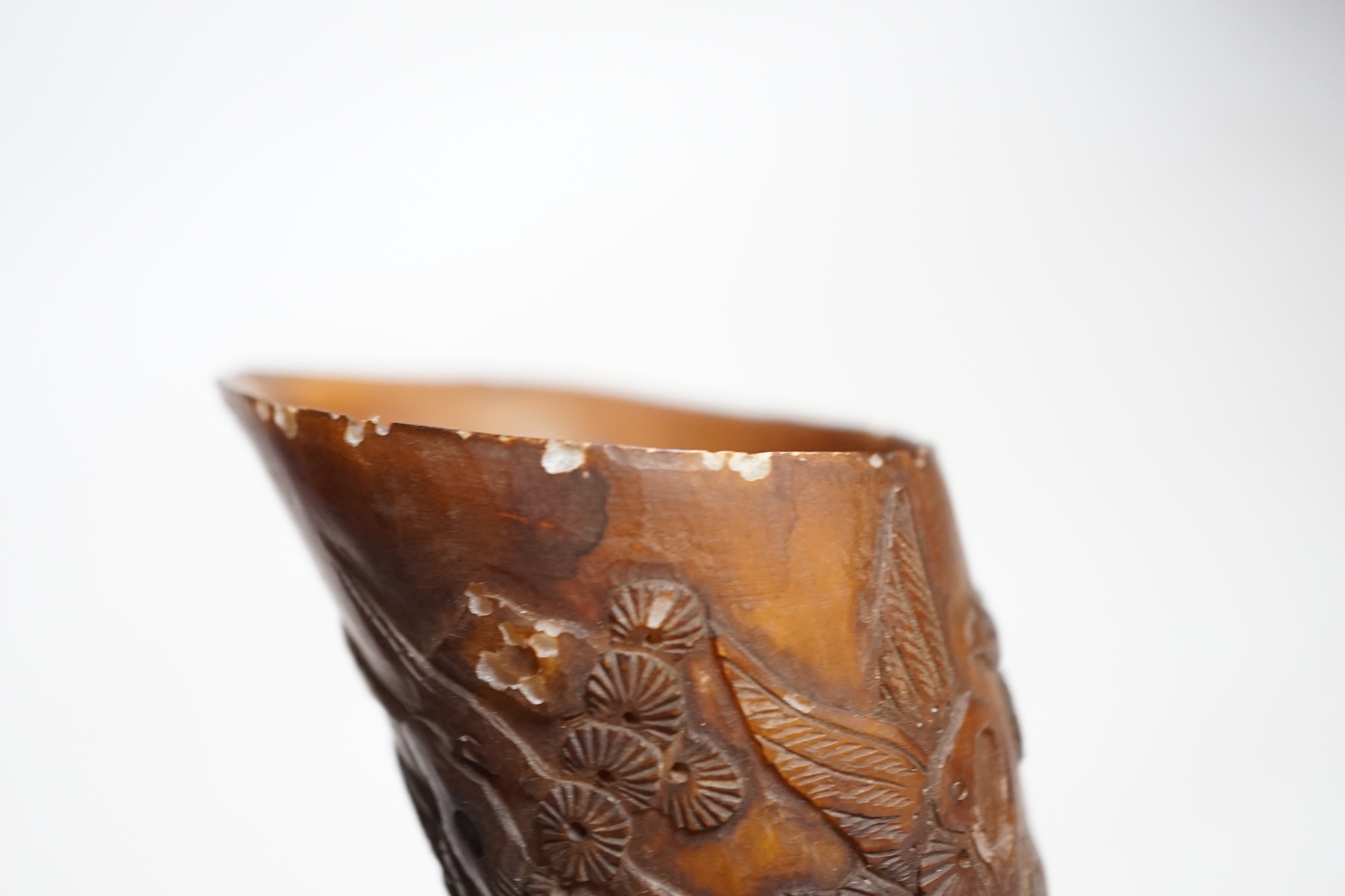 A Chinese carved horn cup 13cm